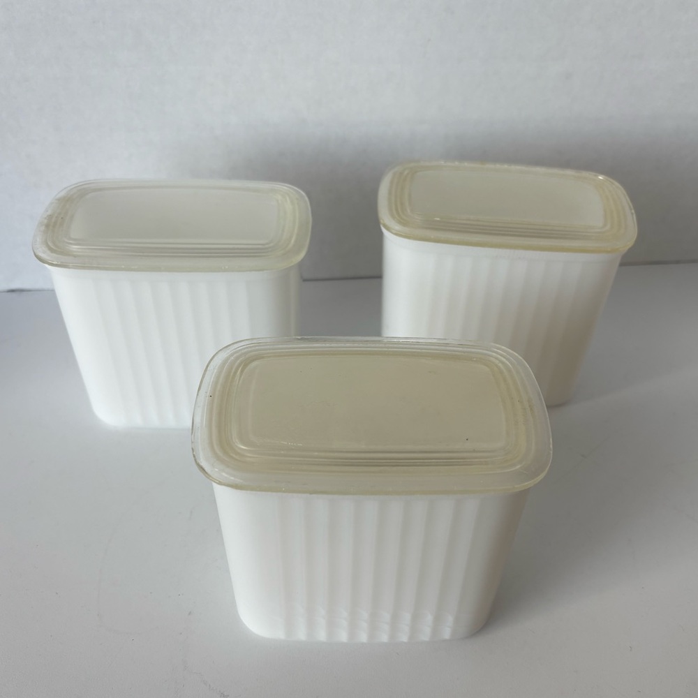 Three Vintage Hazel Atlas white milk glass refrigerator jars with plastic lids